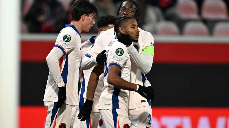 Christopher Nkunku celebrates with his Chelsea team-mates after scoring against Heidenheim in the Europa Conference League