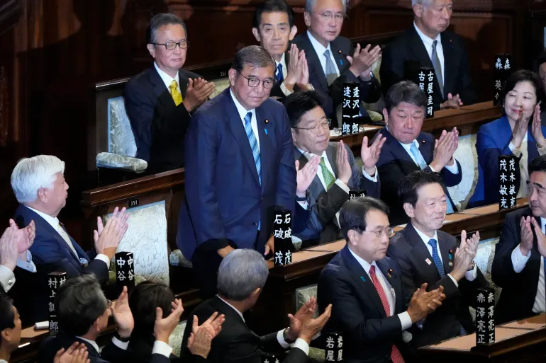 Japan’s PM Ishiba survives parliament vote, to lead minority government