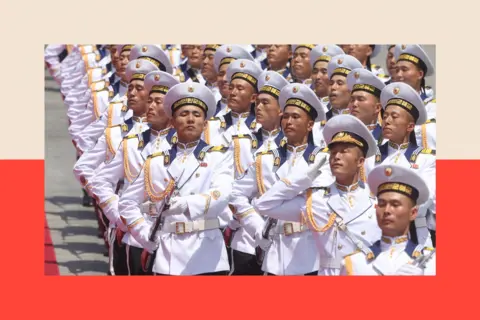 Getty Images North Korean Navy's military officers march during a welcoming ceremony,