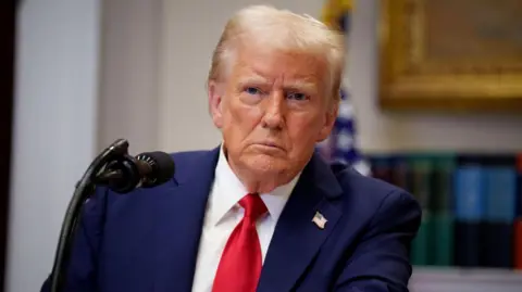 Getty Images U.S. President Donald Trump takes a question from a reporter during a news conference in the Roosevelt Room of the White House on January 21, 2025 in Washington, DC.
