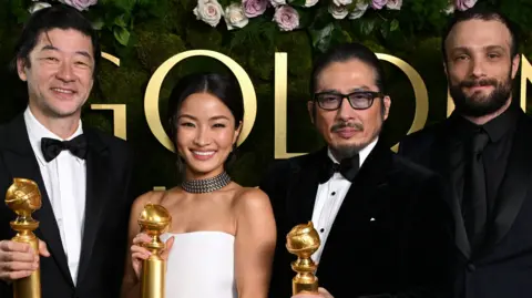 Getty Images Tadanobu Asano, Anna Sawai, Hiroyuki Sanada, and Cosmo Jarvis on the red carpet at the Golden Globes
