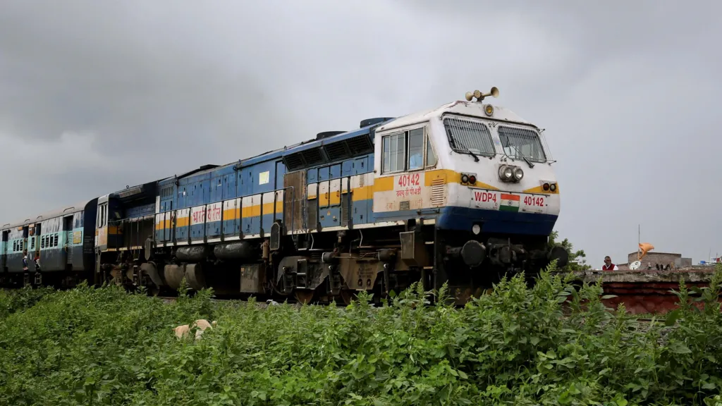 Eleven die in India as passengers fleeing fire fears hit by another train