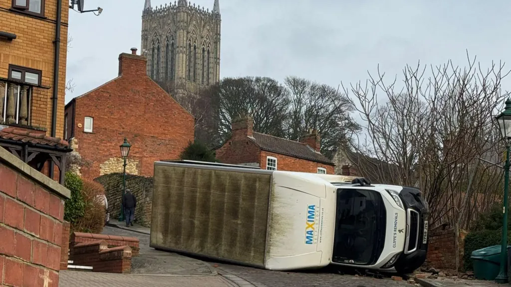 Removal van overturned due to ‘handbrake failure’
