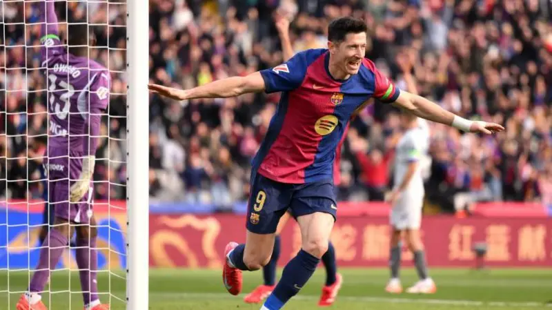 Barca beat Alaves to move four points behind leaders Real