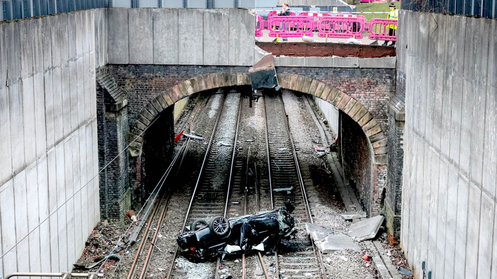 Major travel disruption in Greater Manchester after car crashes on rail lines and driver arrested